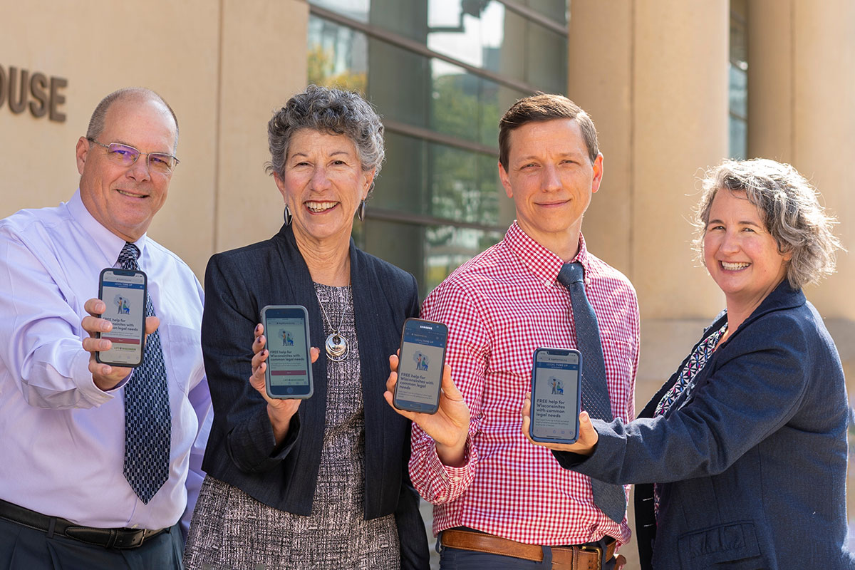 Jon Danforth, Executive Director of EATA; Marsha Mansfield, Director of LIFT Wisconsin; Mitch, UW Law Professor and Director of the Economic Justice Institute; and Sarah Davis, Co-Director of LIFT Wisconsin and UW Law Professor at the Center for Patient Partnerships