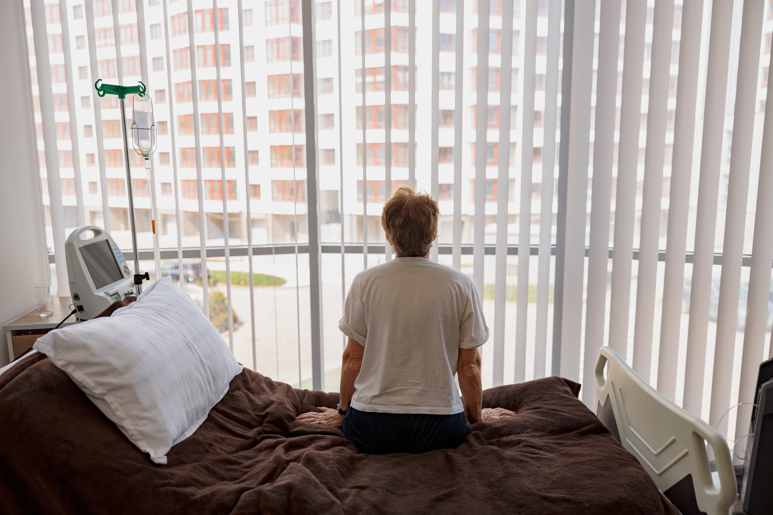 Korean daughter running toward father in sunny room